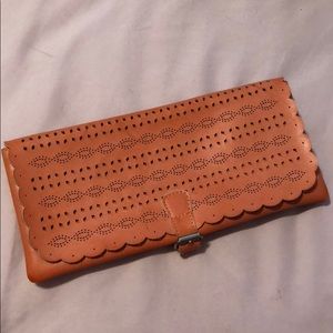 Burnt orange clutch
